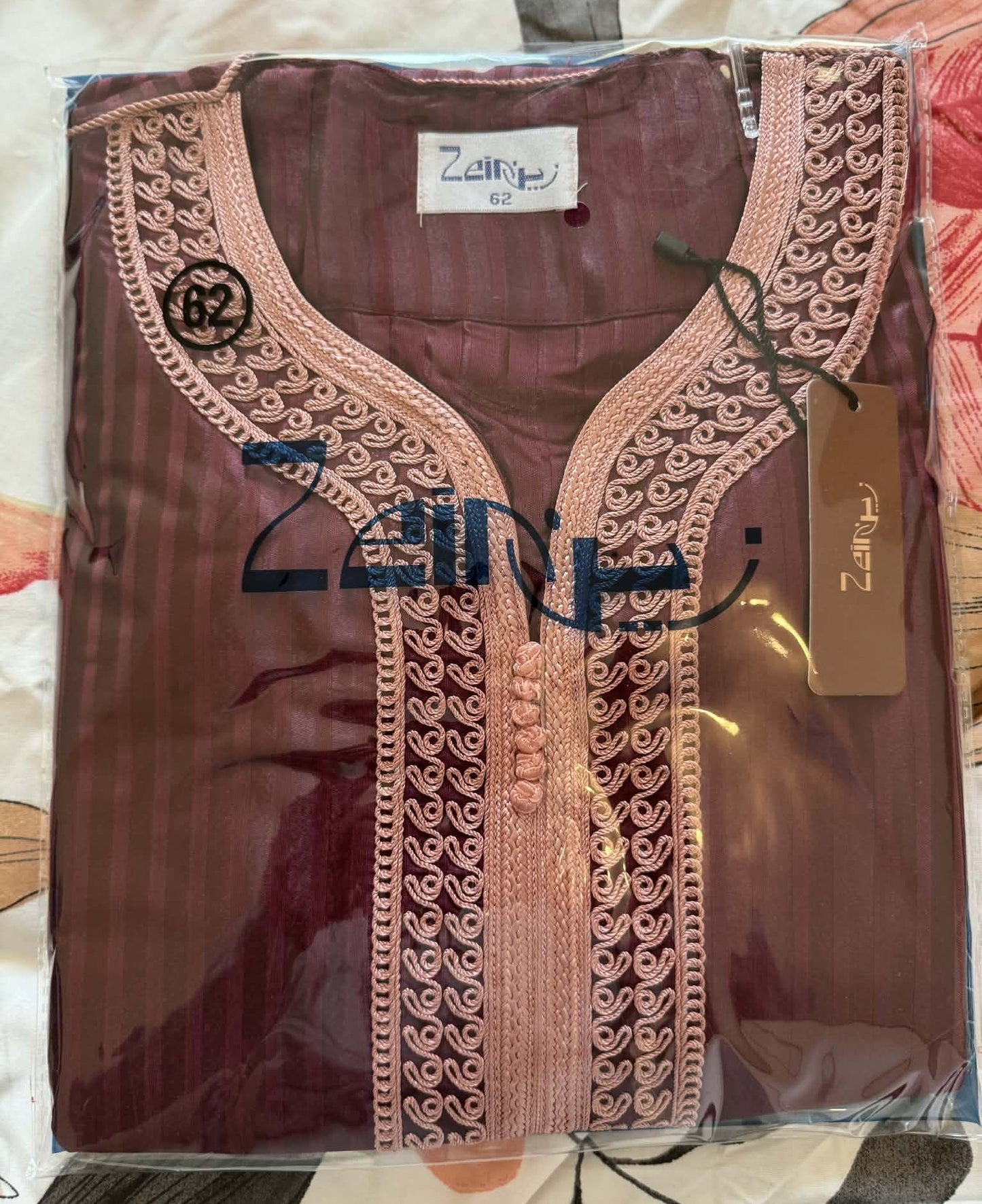 Qamis gondra adulte